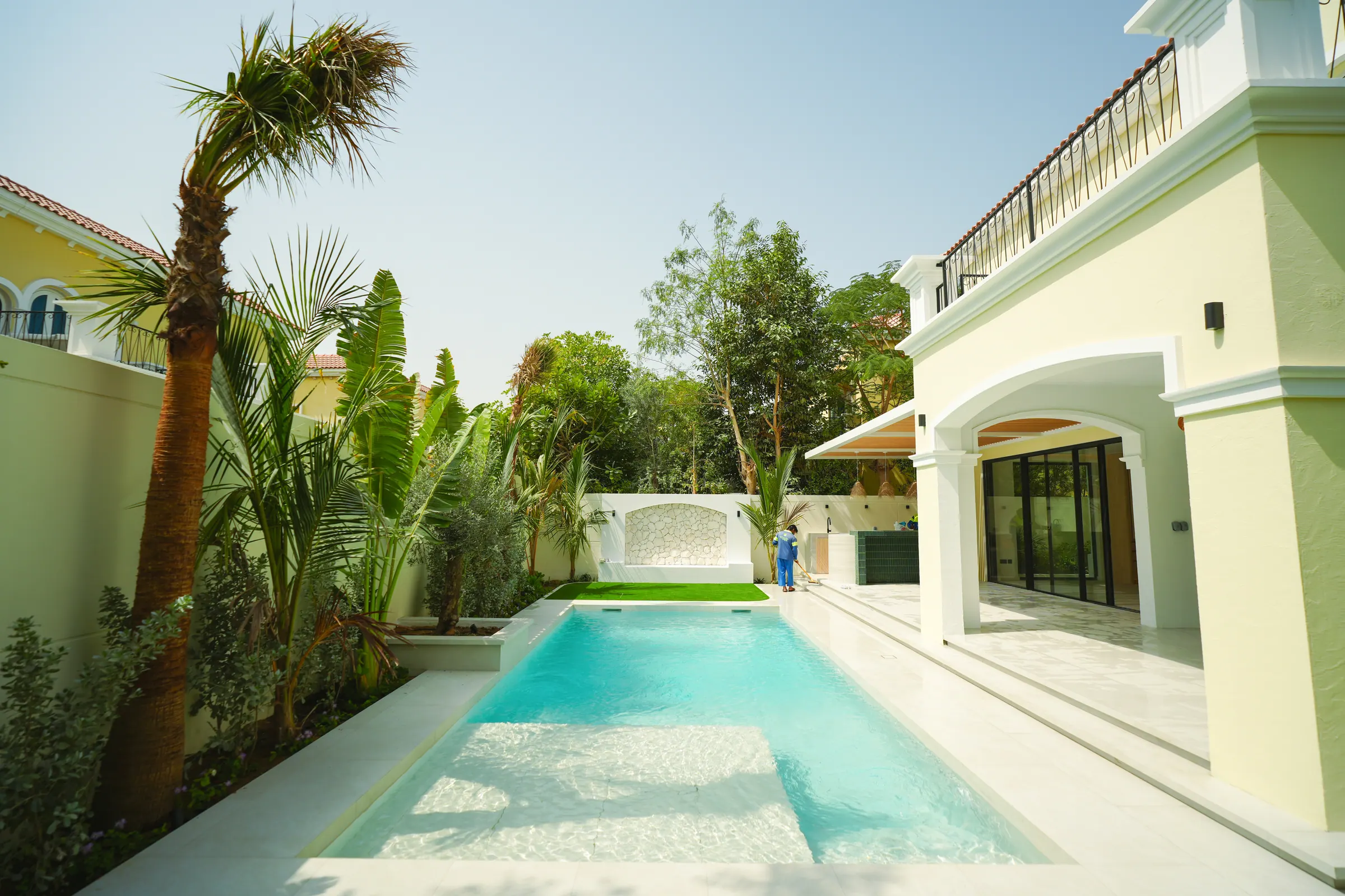 Jumeirah Park villa exterior with the new pool and mature planting